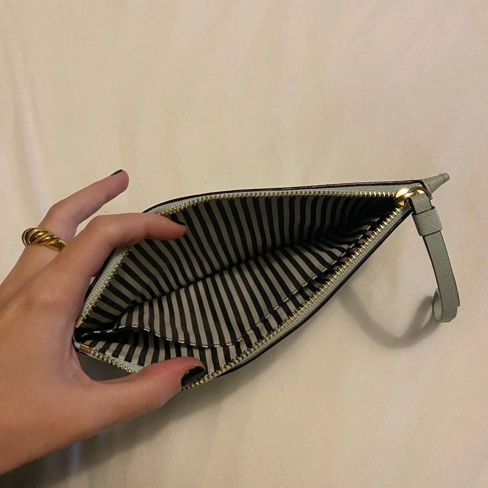 kate spade mint green wristlet clutch with gold logo
